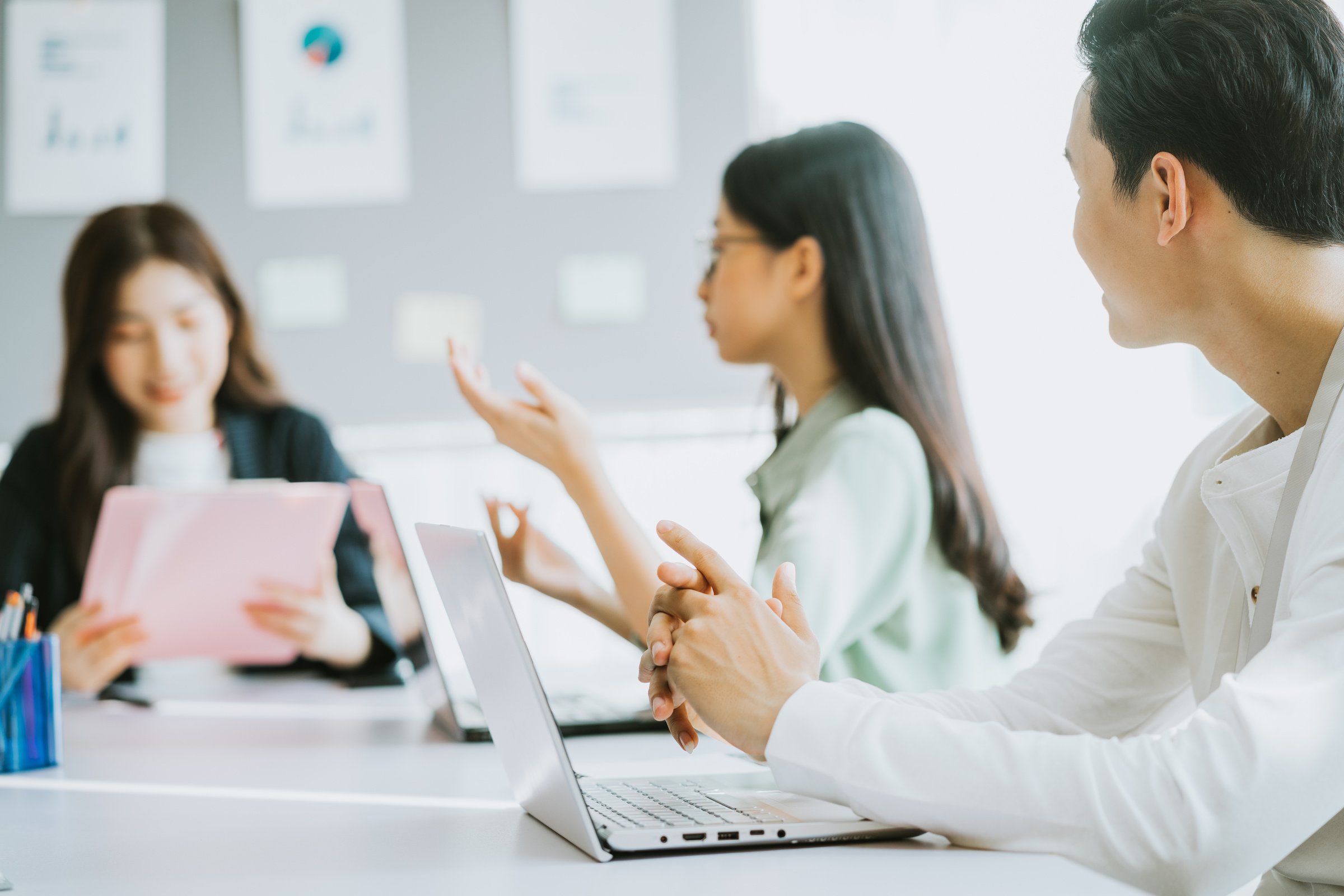 Employees Give Opinions during the Meeting